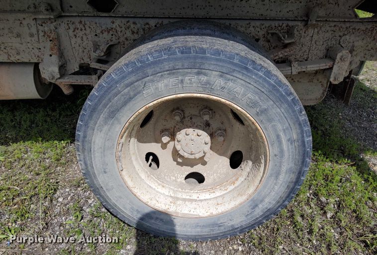 image for item EJ0061 2003 GMC W4 dump flatbed truck