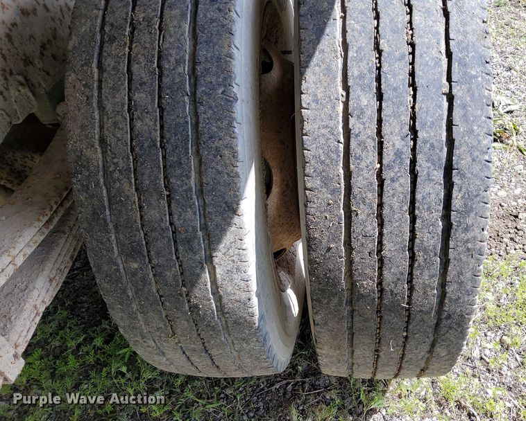 image for item EJ0061 2003 GMC W4 dump flatbed truck