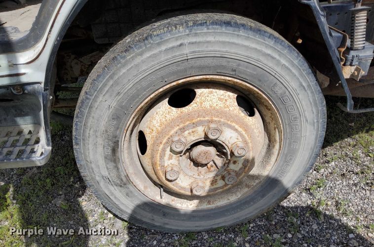 image for item EJ0061 2003 GMC W4 dump flatbed truck