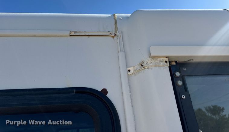 image for item EN4556 1997 Ford E450 Super Duty shuttle bus