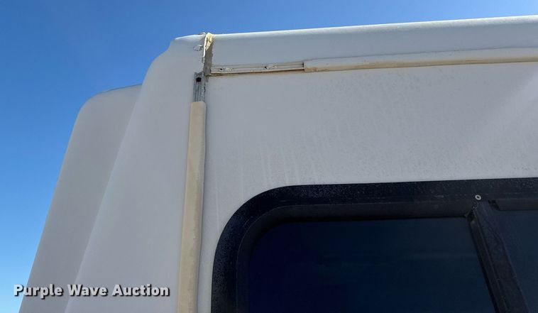 image for item EN4556 1997 Ford E450 Super Duty shuttle bus