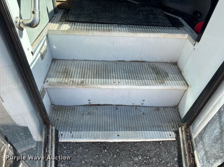 image for item EN4556 1997 Ford E450 Super Duty shuttle bus