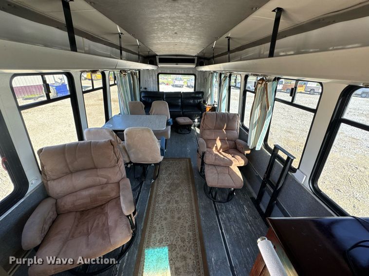 image for item EN4556 1997 Ford E450 Super Duty shuttle bus