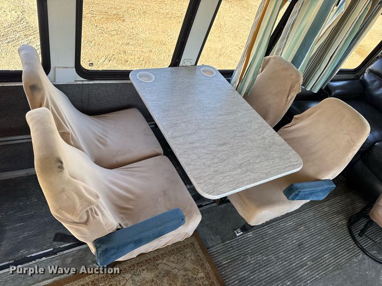 image for item EN4556 1997 Ford E450 Super Duty shuttle bus