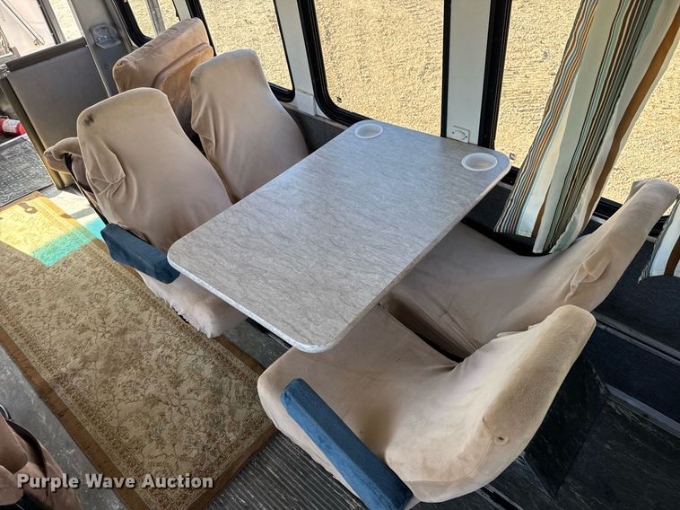 image for item EN4556 1997 Ford E450 Super Duty shuttle bus