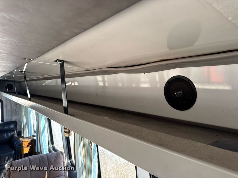 image for item EN4556 1997 Ford E450 Super Duty shuttle bus