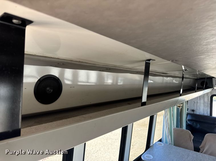 image for item EN4556 1997 Ford E450 Super Duty shuttle bus