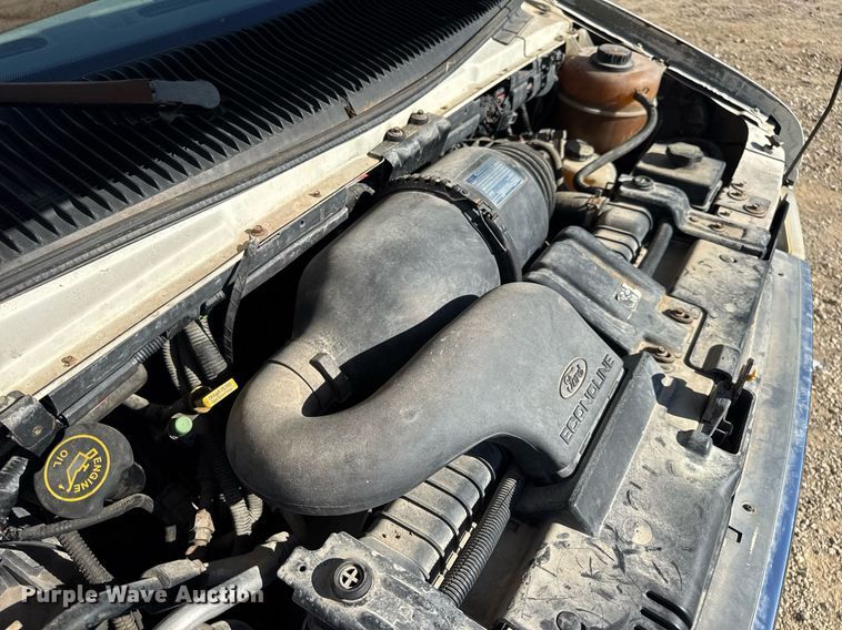 image for item EN4556 1997 Ford E450 Super Duty shuttle bus