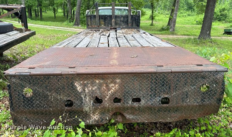 image for item JX9283 1973 Ford F700 rollback truck