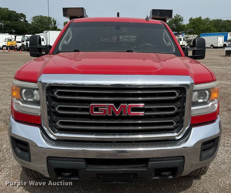 image for item DY0011 2015 GMC Sierra 3500HD Crew Cab utility bed pickup truck