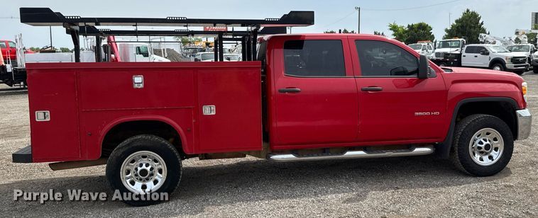 image for item DY0011 2015 GMC Sierra 3500HD Crew Cab utility bed pickup truck
