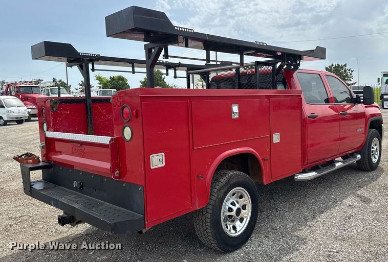 image for item DY0011 2015 GMC Sierra 3500HD Crew Cab utility bed pickup truck