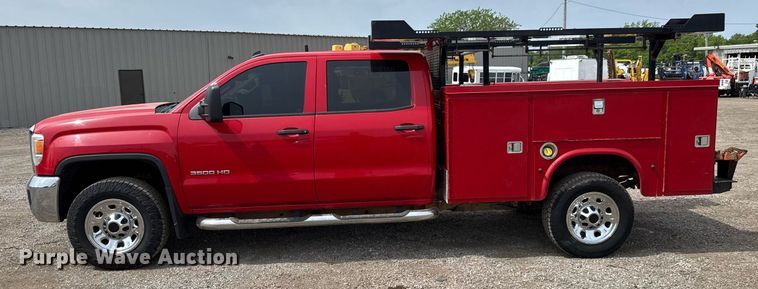 image for item DY0011 2015 GMC Sierra 3500HD Crew Cab utility bed pickup truck