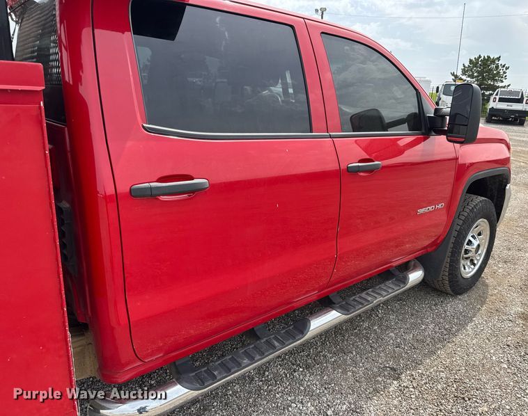 image for item DY0011 2015 GMC Sierra 3500HD Crew Cab utility bed pickup truck