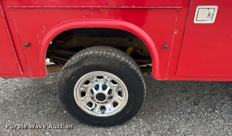 image for item DY0011 2015 GMC Sierra 3500HD Crew Cab utility bed pickup truck