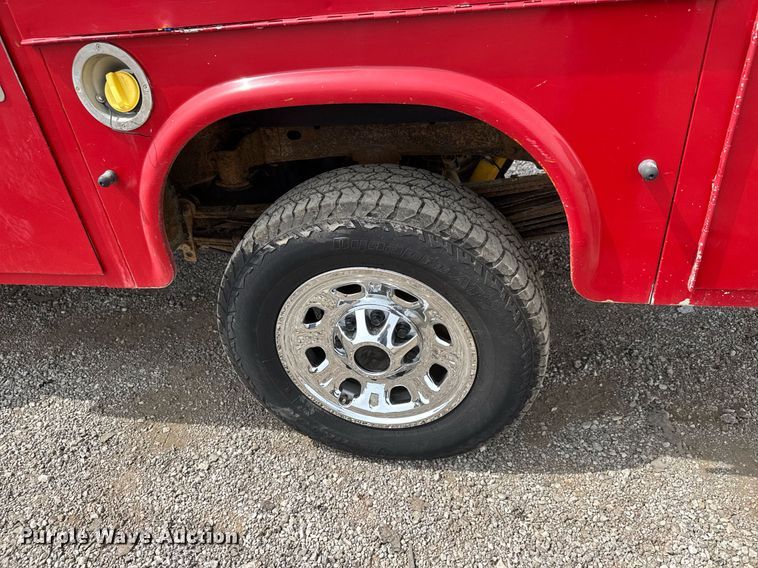 image for item DY0011 2015 GMC Sierra 3500HD Crew Cab utility bed pickup truck