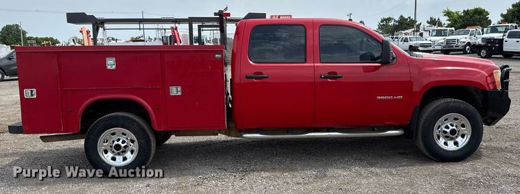 image for item DY0012 2013 GMC Sierra 3500HD Crew Cab utility bed pickup truck