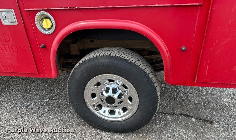 image for item DY0012 2013 GMC Sierra 3500HD Crew Cab utility bed pickup truck