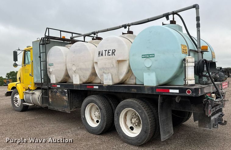 image for item DY0039 1992 White GMC WCA water truck