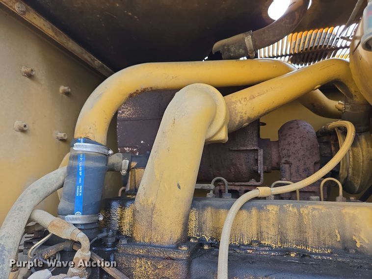 image for item EC4218 1997 Caterpillar 12H motor grader