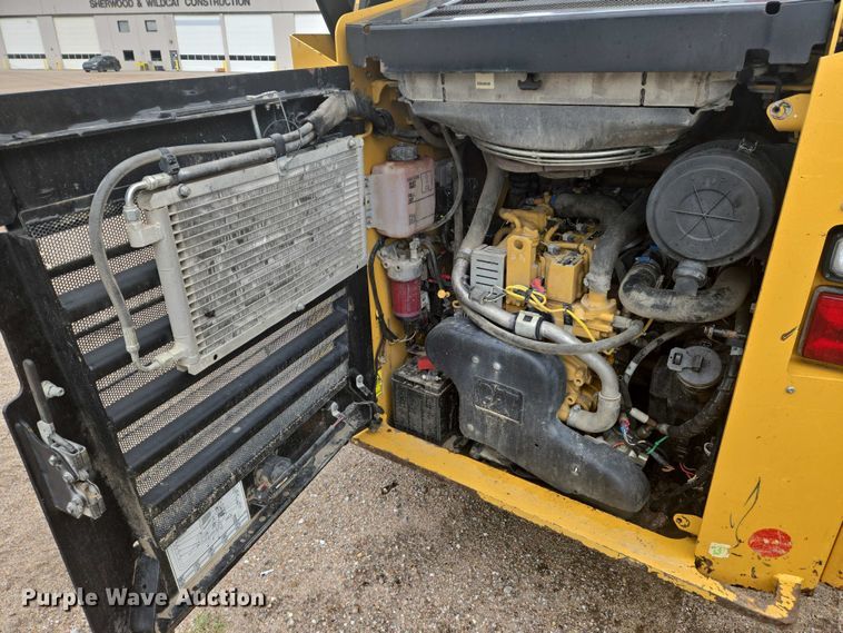 image for item EN8021 2015 Caterpillar 289D tracked skid steer loader