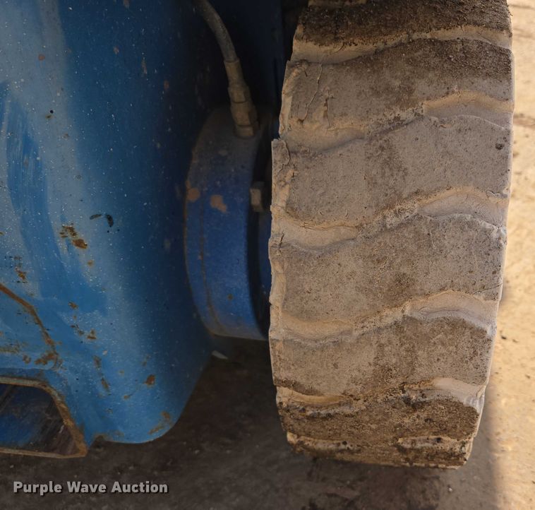 image for item ER5244 1999 Genie GS3246 scissor lift