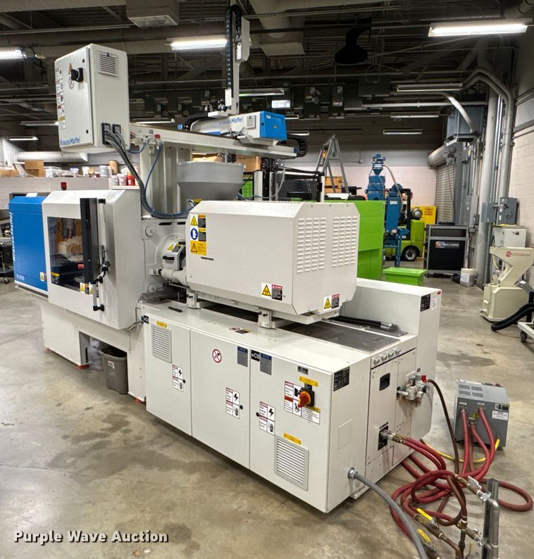 image for item DU9773 2017 KraussMaffei KM-81-100-PX injection molding machine