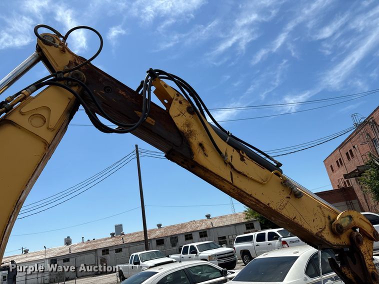 image for item EG8440 2001 John Deere 310SG backhoe