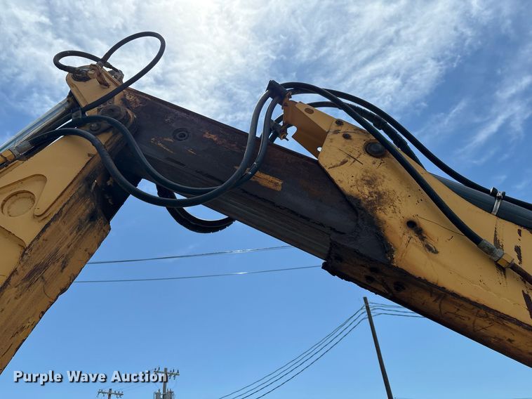 image for item EG8440 2001 John Deere 310SG backhoe