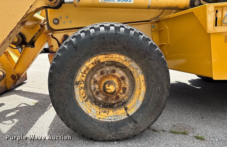 image for item EG8440 2001 John Deere 310SG backhoe