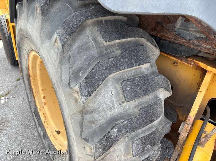 image for item EG8440 2001 John Deere 310SG backhoe