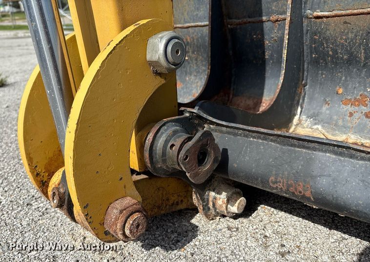 image for item EG8453 2004 Caterpillar BH30 skid steer backhoe