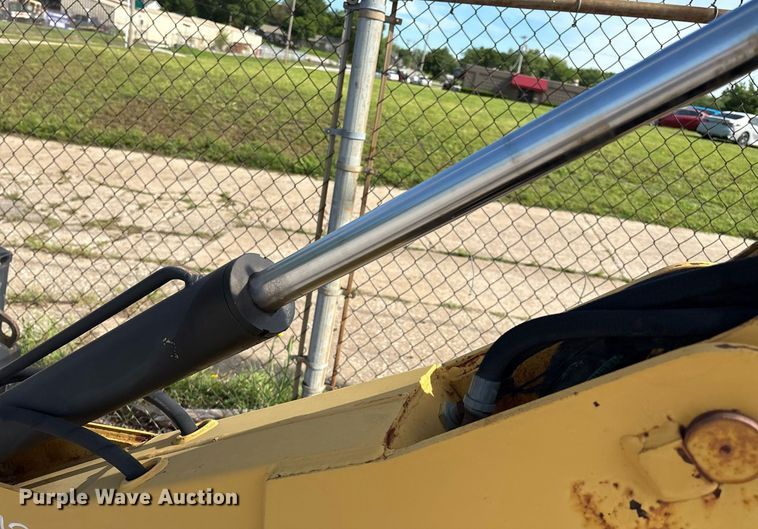 image for item EG8453 2004 Caterpillar BH30 skid steer backhoe