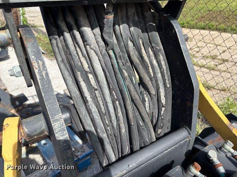 image for item EG8453 2004 Caterpillar BH30 skid steer backhoe