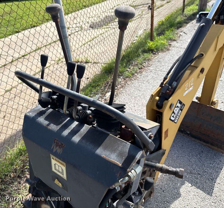 image for item EG8453 2004 Caterpillar BH30 skid steer backhoe