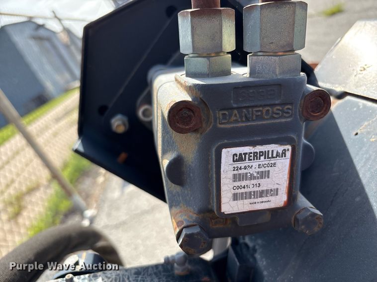 image for item EG8455 2004 Caterpillar LR18B skid steer landscape rake