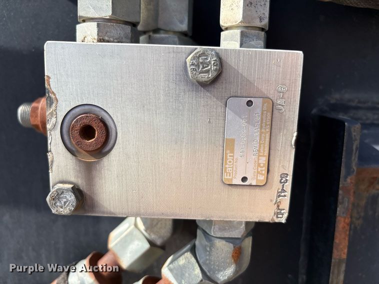 image for item EG8455 2004 Caterpillar LR18B skid steer landscape rake