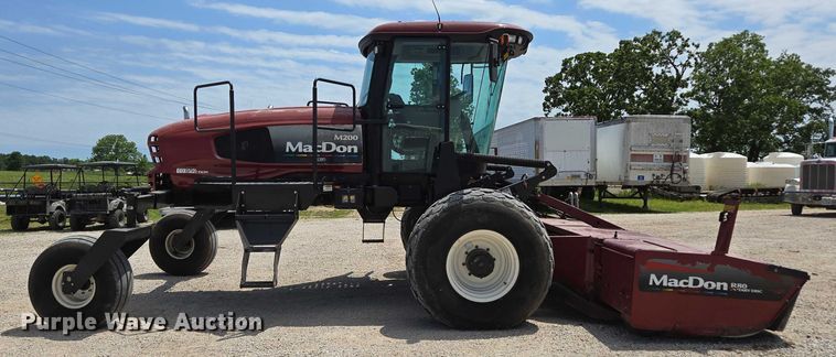 image for item ED2023 2009 MacDon M200 swather / windrower