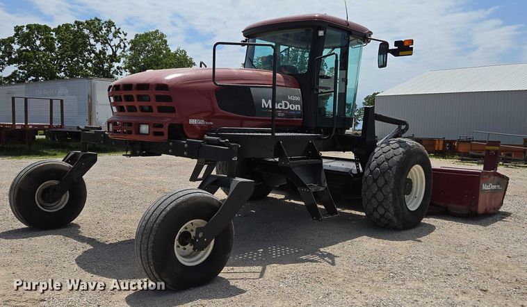 image for item ED2023 2009 MacDon M200 swather / windrower