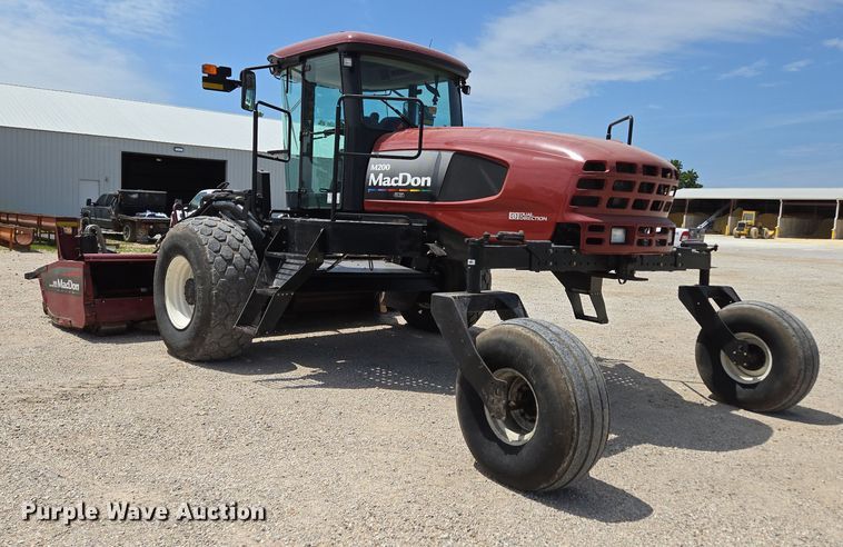 image for item ED2023 2009 MacDon M200 swather / windrower