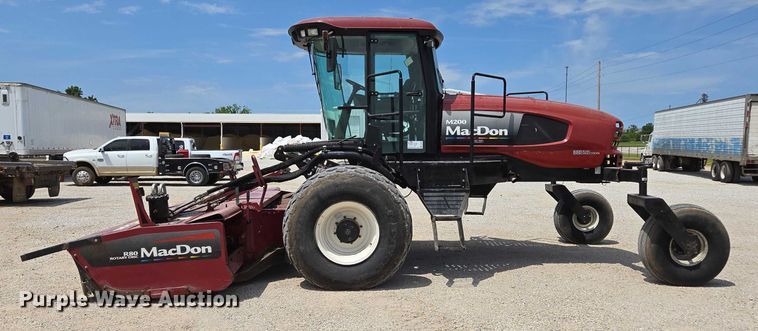 image for item ED2023 2009 MacDon M200 swather / windrower