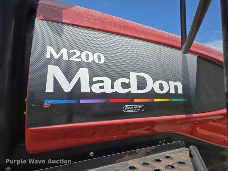 image for item ED2023 2009 MacDon M200 swather / windrower