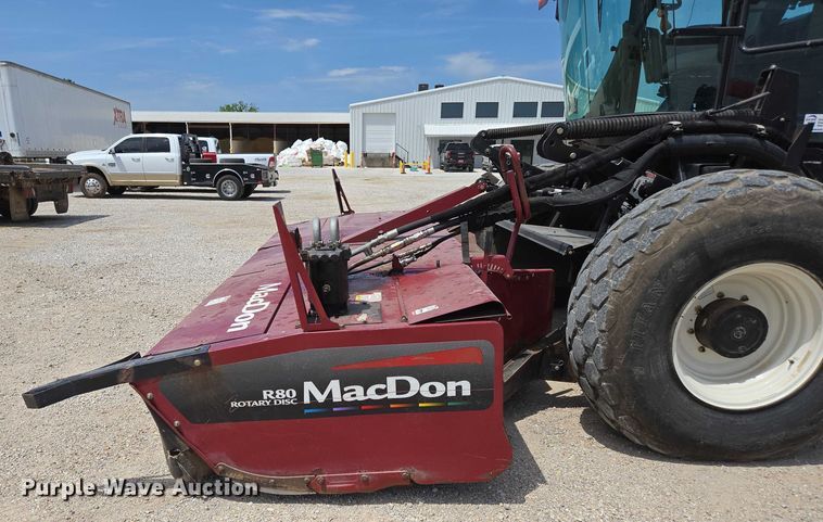 image for item ED2023 2009 MacDon M200 swather / windrower