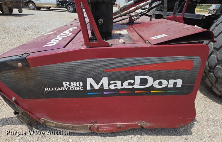 image for item ED2023 2009 MacDon M200 swather / windrower