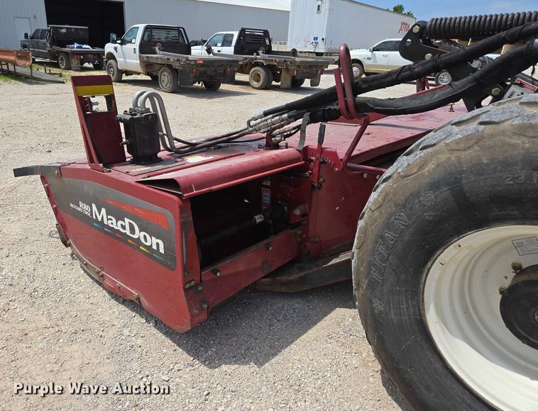 image for item ED2023 2009 MacDon M200 swather / windrower