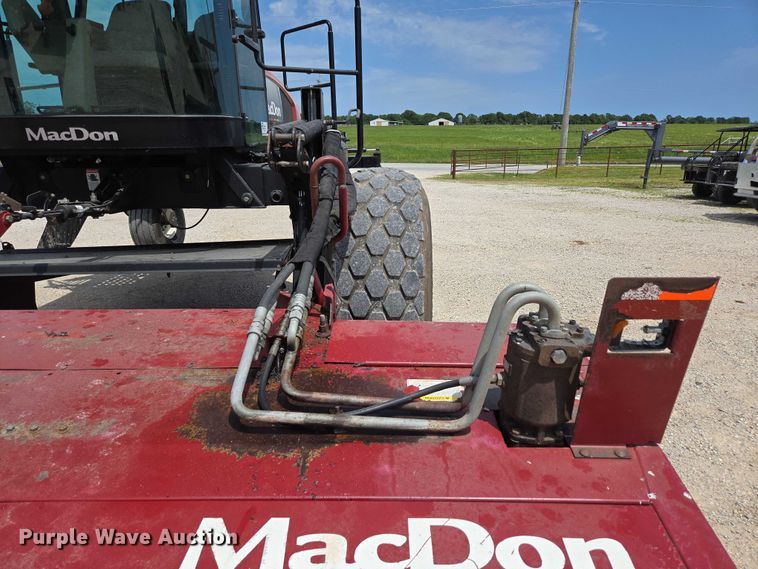 image for item ED2023 2009 MacDon M200 swather / windrower