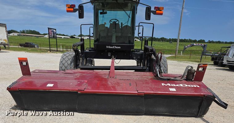 image for item ED2023 2009 MacDon M200 swather / windrower