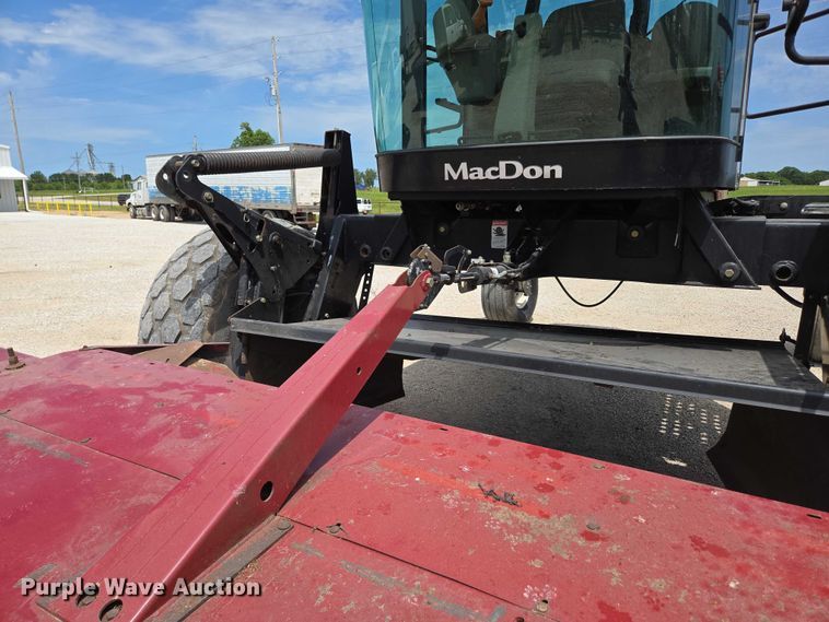 image for item ED2023 2009 MacDon M200 swather / windrower