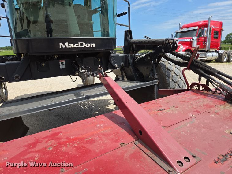image for item ED2023 2009 MacDon M200 swather / windrower