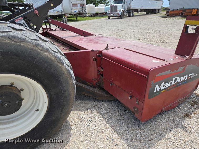 image for item ED2023 2009 MacDon M200 swather / windrower